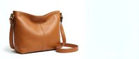 Brown leather crossbody bag with adjustable strap isolated on white background for fashion accessories and handbag design projects.