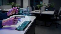 Business professional analyzing financial data on tablet with holographic charts and graphs in modern office environment for investment planning.