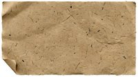 Vintage handmade paper texture with natural fibers and organic inclusions for crafting and design projects.