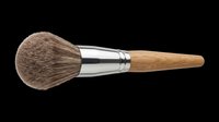 Makeup powder brush with soft bristles and wooden handle, isolated on transparent background, ready for beauty, cosmetic, T-shirt, sticker, and print on demand design use.