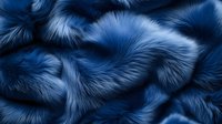 Luxurious navy blue fur texture with soft, fluffy fibers creating waves and folds. Natural looking animal fur background pattern for fashion and textile design projects.
