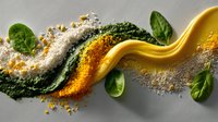 Vibrant wave of colorful spices and herbs with fresh spinach leaves flowing on light background, dynamic food composition with powdered seasonings and aromatic ingredients.