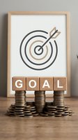 Wooden blocks spelling GOAL with coin stacks and target dartboard poster representing financial planning success and achievement motivation for business growth.