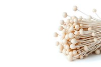 Fresh white enoki mushrooms bunch isolated on white background, organic Japanese ingredient for Asian cuisine and healthy cooking.