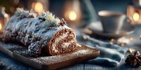 Festive chocolate yule log cake with powdered sugar and rosemary garnish on wooden board. Holiday dessert for Christmas celebrations and winter gatherings.