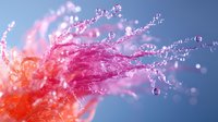 Dynamic pink and orange liquid splash with water droplets frozen in motion against blue background, creating abstract art pattern for creative design projects.