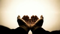 Hands forming heart shape against bright backlit background, symbolizing love, care, and compassion for healthcare, charity, and wellness campaigns.