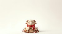 Cute stuffed pig toy wearing red scarf surrounded by autumn leaves and berries on neutral background for holiday decoration and seasonal greeting cards.