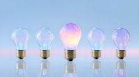 Glowing light bulbs in pastel colors arranged in row on reflective surface with one central bulb illuminated brighter, creative energy concept.