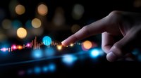 Finger touching digital graph with glowing financial chart data visualization on dark background with colorful bokeh lights and market analysis display.