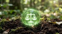Green glowing sphere with justice scales symbol on forest soil represents environmental law, sustainability legal concepts and eco-friendly regulations.