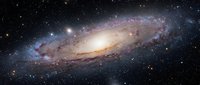 Spectacular spiral galaxy with glowing core and dust lanes against starfield background for astronomy education and space exploration content.