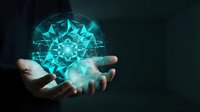 Unrecognizable person holding glowing turquoise geometric sphere with interconnected lines and nodes, representing technology, artificial intelligence, data networks, and digital innovation concepts.
