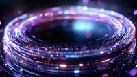 Glowing circular light trails with purple and blue bokeh effects create futuristic abstract background with depth and motion blur for technology concepts.