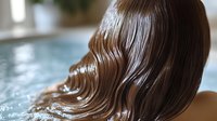 Glossy brown hair waves flowing elegantly against blurred swimming pool background, showcasing luxurious haircare results.