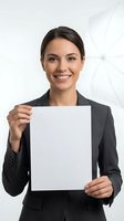Young professional woman with dark hair and Mediterranean ethnicity wearing charcoal blazer holding blank white paper sheet against white background, suitable for business marketing and corporate messaging.