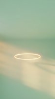 Minimalist neon oval ring glowing on soft sage and cream gradient background with shadow play, suitable for modern design projects.