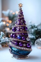Elegant spiral Christmas tree decoration with purple glass baubles, crystal rhinestones, and turquoise base topped with golden star against soft bokeh background.