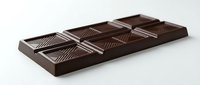 Dark chocolate bar with segmented squares featuring diagonal stripe patterns, isolated on white background for food and confectionery design use.