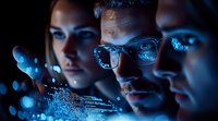 Team of diverse tech professionals analyzing digital data with blue holographic interface displays for cybersecurity and software development projects.