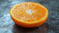 Fresh juicy orange half with water drops on dark background shows vibrant citrus pulp segments and natural texture in macro photography.