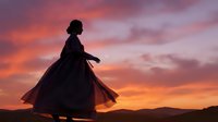 Young woman silhouette in flowing dress walking against dramatic sunset sky with vibrant pink and orange clouds over mountain landscape for lifestyle content.