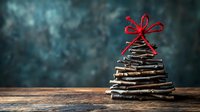 Rustic wooden stick Christmas tree with red ribbon bow on weathered wood surface against dark bokeh background for holiday decorating and seasonal crafts.