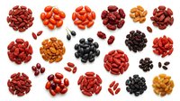 Assorted dried beans and legumes arranged in clusters on white background, including red kidney beans, black beans, pinto beans, and lentils. Suitable for food packaging, nutrition guides, cooking blogs, and culinary design projects.