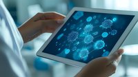 Medical professional examining viral cell structure on digital tablet display with glowing blue microscopic visualization of coronavirus molecules.