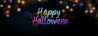 Colorful neon Happy Halloween text glowing against dark background with blurred bokeh lights and decorative spooky elements creates festive holiday atmosphere.
