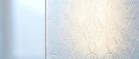 Modern geometric hexagonal pattern wall texture with soft lighting creates elegant interior design backdrop for contemporary home decor and architectural projects.