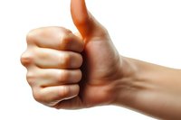 Close-up of hand showing thumbs up gesture against white background, expressing positivity, approval and success. Isolated photo ready for commercial use.