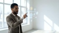 Professional businessman interacting with holographic digital interface displaying security icons in modern office environment for technology presentations.