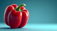 Fresh red bell pepper with green stem on turquoise background for healthy cooking and nutrition concepts.