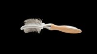 Curved pet grooming brush with natural wooden handle and dual-row bristles, isolated on transparent background. Ready for clipart, print-on-demand, sublimation, and design projects.