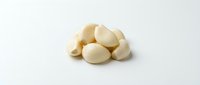 Peeled garlic cloves isolated on white background, ready for cooking, culinary use, food preparation, and recipe ingredients for kitchen design projects.