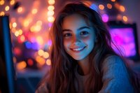 Young woman smiling at camera in cozy evening atmosphere with bokeh lights background creating magical mood, wearing knit sweater, illuminated by colorful neon glow.