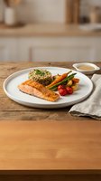 Grilled salmon fillet with quinoa, roasted vegetables and cherry tomatoes on white plate in modern kitchen setting for healthy dining and nutrition content.