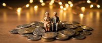 Miniature elderly couple figurines sitting on pile of coins with warm bokeh lights background representing retirement savings and financial planning.