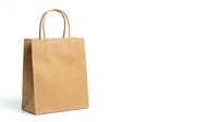 Brown kraft paper shopping bag with twisted handles isolated on white background for retail packaging and eco-friendly commerce applications.