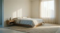 Minimalist bedroom with wooden platform bed, soft linens, and sheer curtains allowing natural light through large window, creating serene sleeping space.