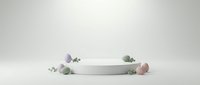 Minimalist white cylindrical podium with pastel spheres and eucalyptus leaves on neutral background for product display and branding presentations.