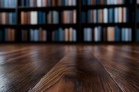 Dark creates atmospheric library or study room setting. Low angle perspective highlights wood grain texture.