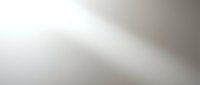 Abstract soft gray gradient background with smooth flowing curves and gentle light effects for modern design projects.