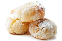 Homemade crinkle cookies dusted with powdered sugar on white background, fresh baked Italian wedding treats isolated for culinary and bakery designs.