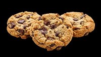 Three chocolate chip cookies isolated on transparent background, ready for t-shirt design, stickers, clipart, print on demand, and sublimation projects.