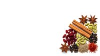 Aromatic spices and herbs collection with cinnamon sticks, star anise, cardamom pods, peppercorns and saffron isolated on white background for culinary use.