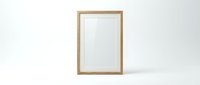 Empty wooden frame mockup on white background for artwork display and interior design projects.