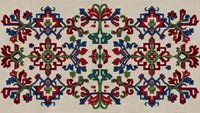 Traditional folk embroidery pattern with colorful geometric motifs and floral elements on beige fabric background for textile design and cultural crafts.
