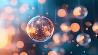 Glowing glass ornament with warm orange lights and bokeh effect creates magical festive atmosphere against blurred blue background. For holiday designs.